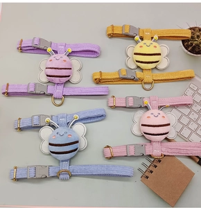 Corduroy pet harness set in purple, yellow, blue, and pink with plush bee detail
