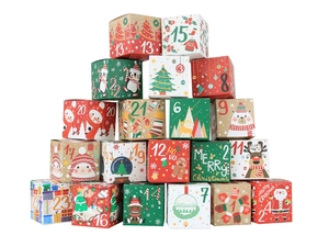 Pyramid stack of 24 colorful Christmas advent calendar boxes with festive holiday patterns