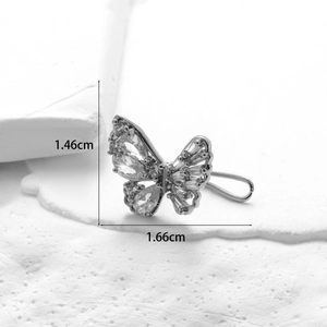 Macro detail of butterfly ear cuff with cubic zirconia micro-pave and dimensions
