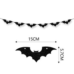 Close-up of glittery black bat banner decorations for Halloween with size dimensions