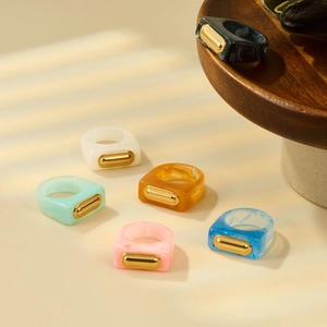 Colorful resin square rings with gold metal inlay in six vibrant assorted colors