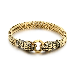 Polished 18K gold-plated titanium steel bracelet with double snake head design
