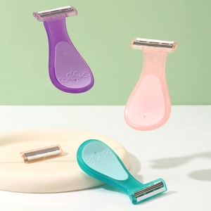 Portable women's razor set with three colorful handles and one replaceable blade head