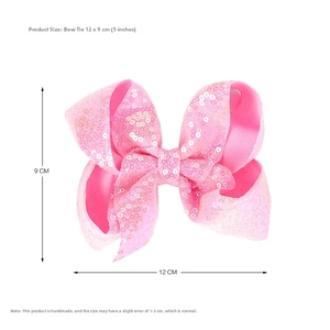 Detailed size view of a 5-inch bright pink sequin bow hair clip for young girls