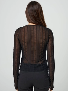 Detailed back view of black sheer long-sleeve top showing vertical textured mesh fabric