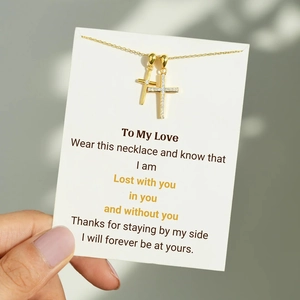 Gold s925 silver double cross pendant necklace for women shown on a romantic gift card