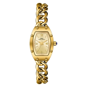 Montre bracelet dorée en forme tonneau avec chaîne épaisse et pierre bleue sur la couronne