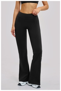 Close-up of the wide waistband and high-waist design on black flared yoga pants