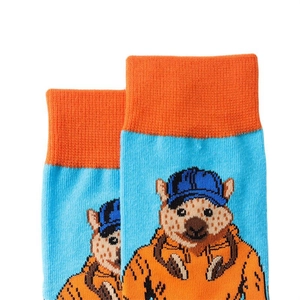 Detail shot of blue and orange knit socks with cartoon hyena graphic and ribbed cuff