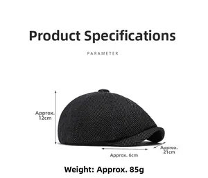 Detail view of dark grey herringbone newsboy cap showing dimensions and fabric texture