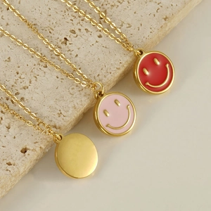 18K gold plated stainless steel necklaces with pink and red enamel smiley face pendants