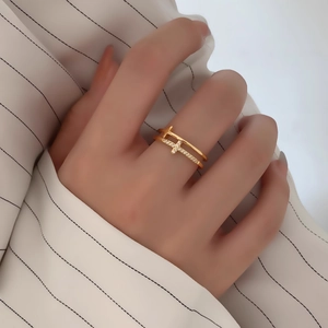 Minimalist gold double layer cross ring with cubic zirconia for women on finger