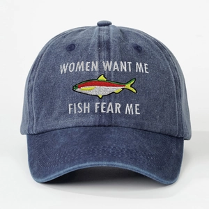 Navy blue washed denim baseball cap with fish embroidery and Women Want Me text