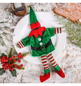 Detail of Christmas elf wine bottle cover set with green velvet and red felt accents
