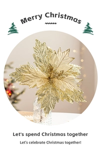 Close-up of golden glitter artificial Poinsettia flower for Christmas tree decoration
