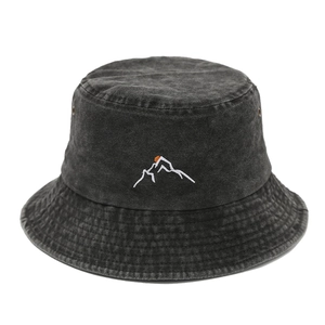 Faded charcoal bucket hat with mountain sunset embroidery and vintage washed texture