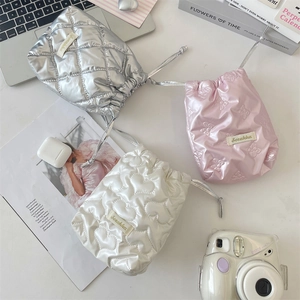Chic quilted PU leather drawstring pouches in silver, pink and white with heart patterns