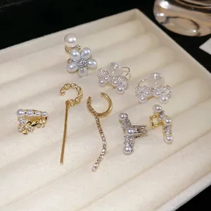 Ensemble de boucles d'oreilles perles et zircons vintage avec nœuds et motifs floraux