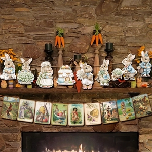 Detail of vintage Easter banners with rabbit cutouts and retro cards over a fireplace