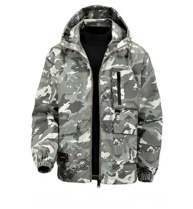 Detailed view of the gray camouflage windbreaker jacket with functional cargo pockets