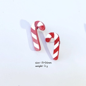 Festive red and white glitter candy cane Christmas stud earrings made of acrylic material