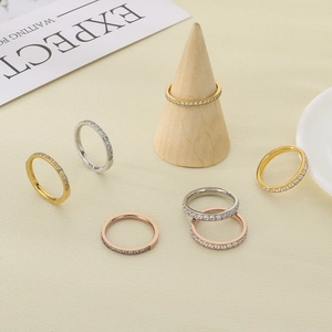 Single row diamond titanium steel rings in gold, silver and rose gold finishes
