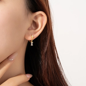 S925 sterling silver gold hoop earring with rectangular zircon on female model