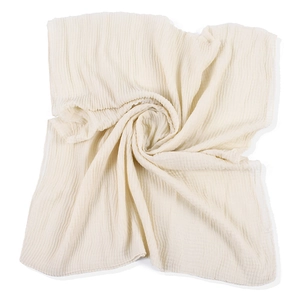 Detailed view of the crinkled texture on a cream-colored cotton linen scarf for women