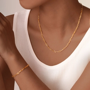 Elegant gold engraved chain link necklace and bracelet set for women with polished finish