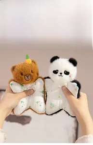 Detailed view of plush bear and panda finger puppets with floral fabric bodies