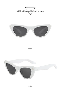 Détail de lunettes de soleil œil-de-chat blanches avec verres gris et finitions en métal