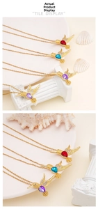 Detailed tile display of hummingbird necklaces with colorful gems and gold plating