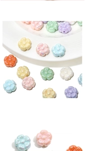 Macro shot of 19mm colorful acrylic flower beads with pearl finish for DIY jewelry making