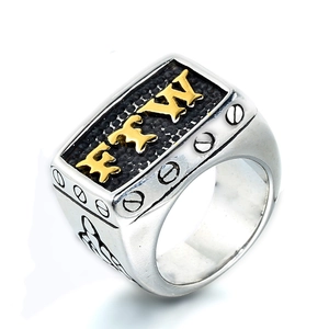Men's punk style stainless steel ring with golden FTW letters on black background
