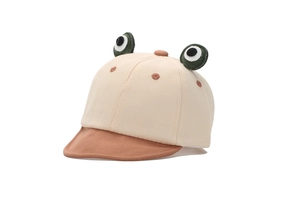 Close-up of baby baseball cap featuring 3D cartoon frog eyes and cotton canvas texture