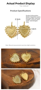 Close-up of golden heart earrings with hammered texture and beaded edges measuring 2.5cm