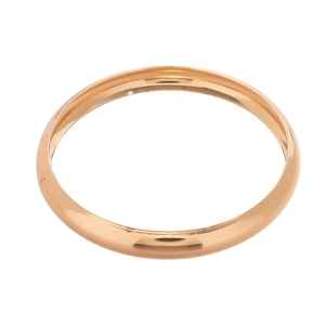Three-piece set of polished geometric metallic bangles with a sleek golden finish
