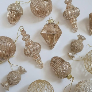 Champagne gold Christmas glass ornaments set with glitter and vertical stripe texture