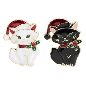 Cute black and white cat Christmas brooches with gold plating and colorful enamel detail