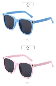 Detail of C3 blue and C4 pink kids sunglasses with golden D-logo decoration on frame