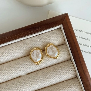 French vintage irregular baroque pearl gold ear clips with elegant textured metal finish
