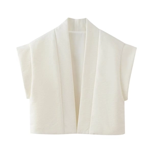 Minimalist white crinkle fabric sleeveless puffer vest shown on a clean white background