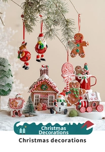 Close-up of festive resin Christmas charms including Santa, elk, and snowman miniatures