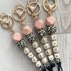 MAMA Letter Beaded Keychain Silicone Geometric Leopard Print Wooden Beads Bag Pendant Suede Tassel Gift For Mom