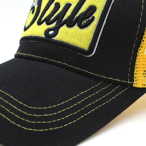 Detailed view of the 3D embroidered Style logo and mesh fabric on baseball cap