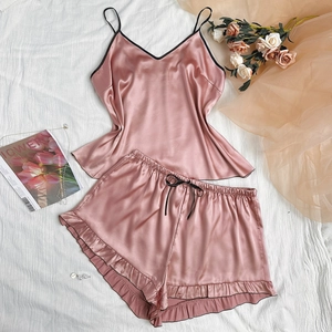 Women's V-neck satin silk pajama set with camisole and ruffle shorts in rose pink