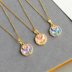 Baroque pearl necklaces featuring floral oil painting pendants in purple, pink, and blue