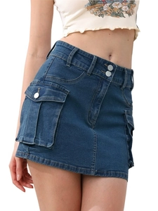 Deep blue denim utility mini skirt with low waist and cargo pockets in street style
