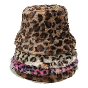 Faux fur leopard print bucket hats in four colors stacked for winter fashion