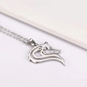 Cool stainless steel wolf head pendant necklace for men on a clean white background